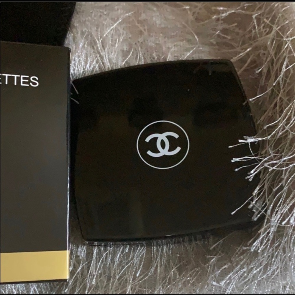 Compact double sided mirror